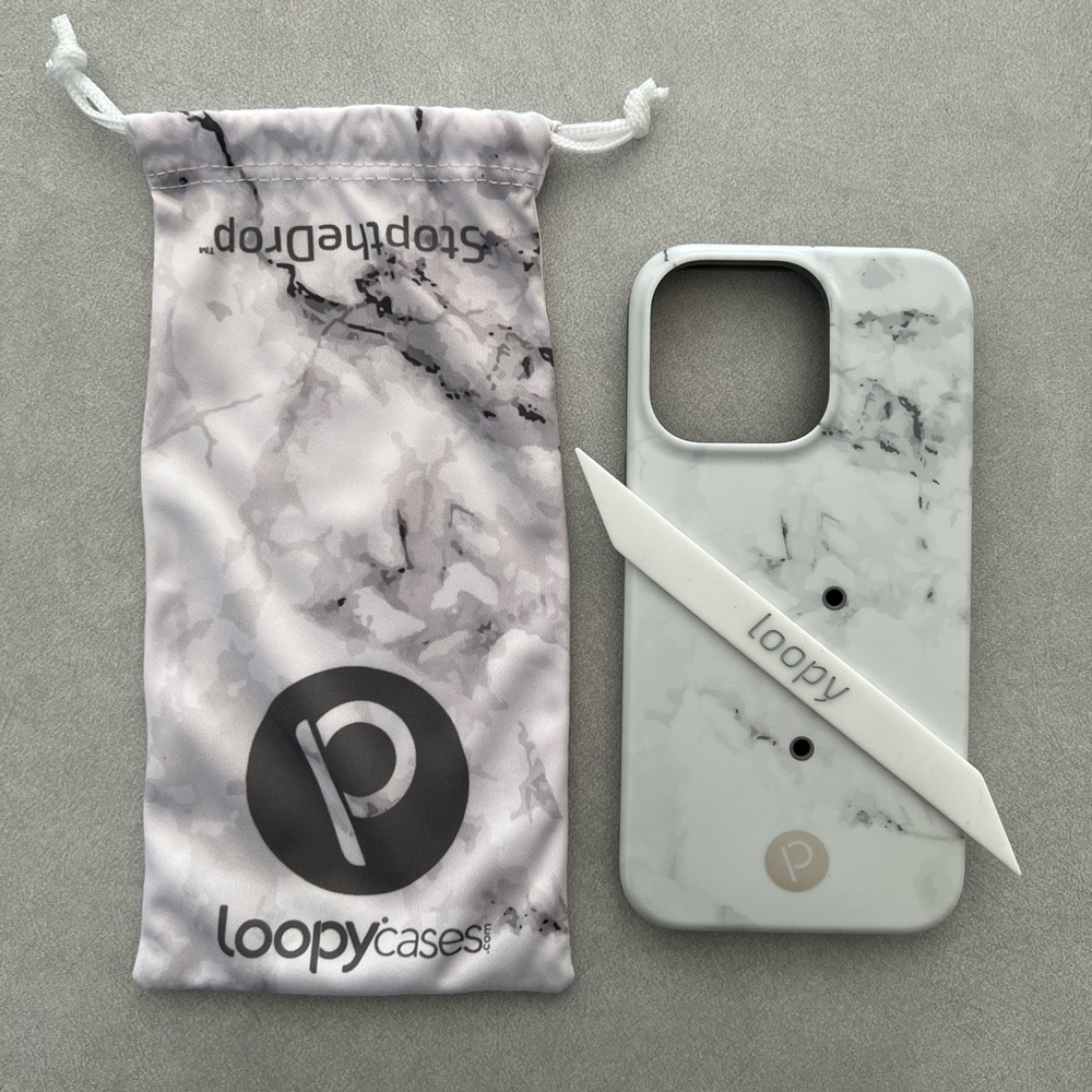 NWOT Loopycases for iPhone 13 Pro. White marble pattern. 6.1” screen